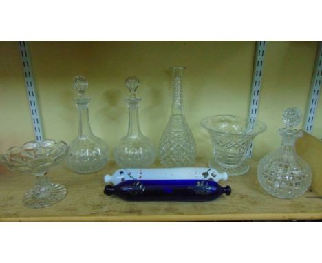 A pair of good quality clear cut glass shaft and globe decanters with printies and other cut detail, a good quality clear cut