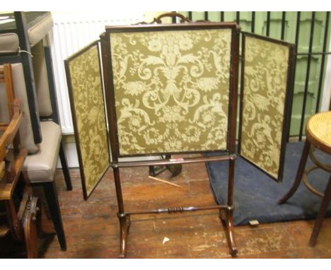 An early 19th century rose framed firescreen with hand worked tapestry panel, winged sides raised on a stretcher base 