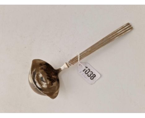 A Georg Jensen double lipped sauce ladle with a stylish reeded handle, 85 g