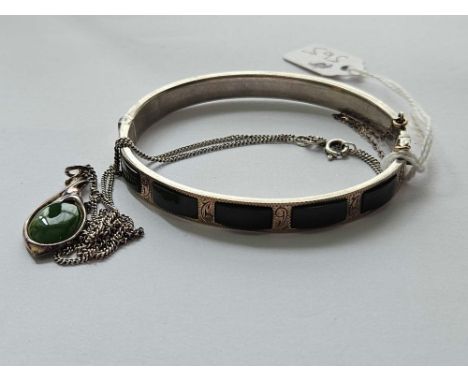 A silver and jade panel bangle with matching silver and jade necklace