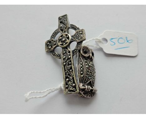 A Celtic style brooch and marcasite owl brooch
