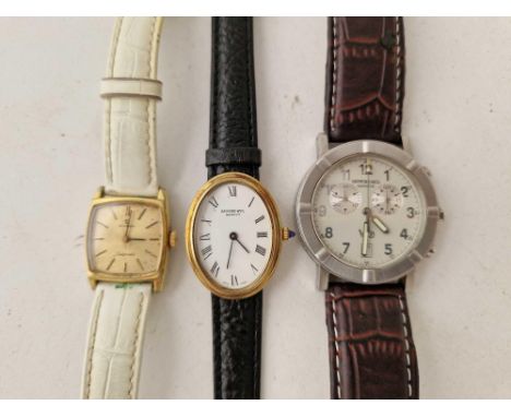 A ladies OMEGA wrist watch and two ladies RAYMOND WEIL wrist watches