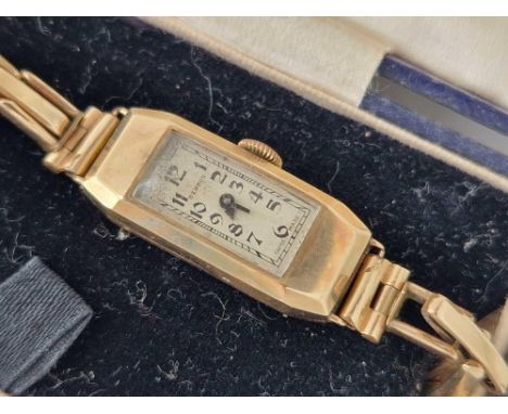 A ladies BENSON tank wrist watch 9ct in original box