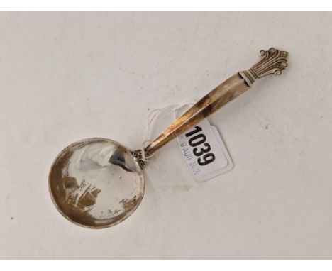 A Georg Jensen Danish ladle with decorative finial