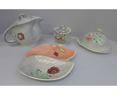 An Art Deco hand painted cheese dish, teapot, preserve pot and dish by Shorter &amp; Son Ltd., Staffs 