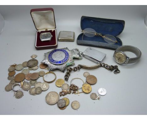 Wristwatches, silver and other coins, a silver identity bracelet, lighters, spectacles, etc. 