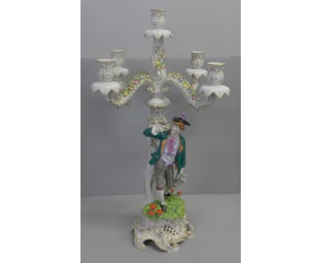 A German porcelain four branch candelabra, 60cm 
