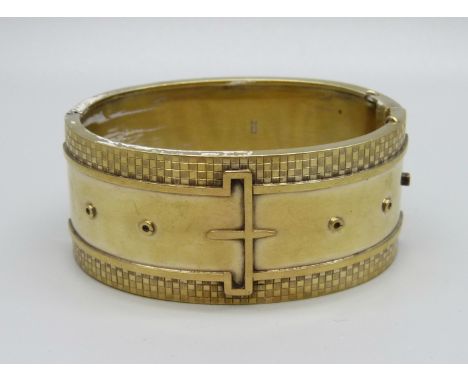 A Victorian silver gilt bangle, Birmingham 1882, inner dimensions 47mm x 60mm 