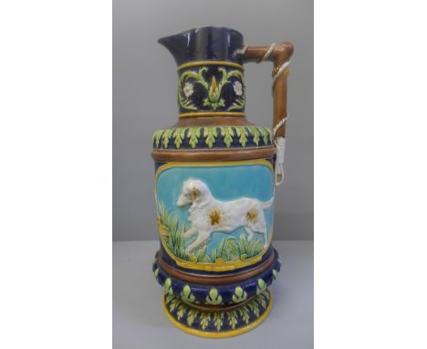 A 19th Century George Jones majolica hunting themed ewer, hairlines to the top rim 