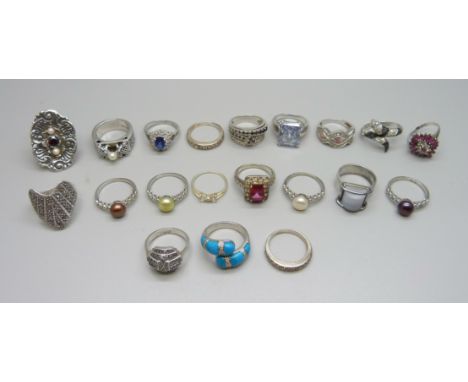 A collection of twenty silver rings 