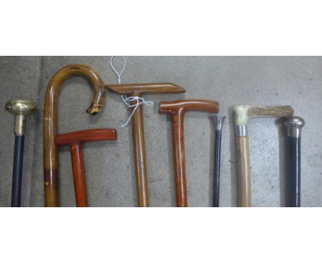 Walking canes, including silver topped and one silver mounted with antler handle 