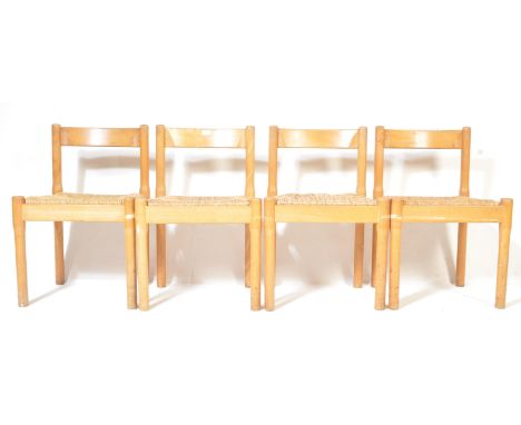 A set of four retro vintage set of four beech wood dining chairs by Vico Magestretti of Habitat having a curved backrest over