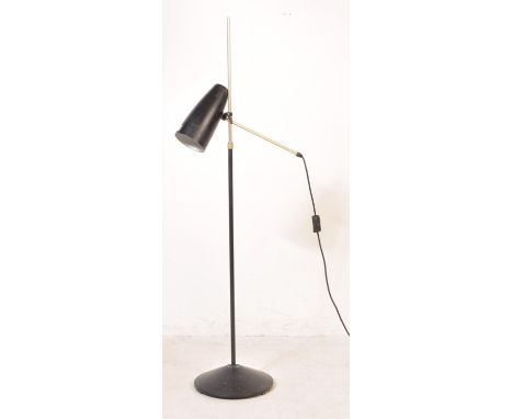 A mid century Italian floor standing / standard lamp. The enamel painted galvanised metal base with upright column having a s