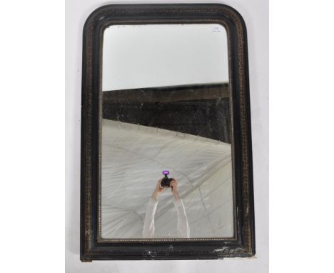 A 19th century Victorian wall mirror / mantle mirror having black ebonised frame with gilt detailing and dome top.&nbsp;Measu