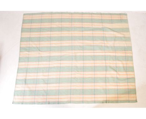 An original vintage retro 20th woollen Welsh blanket. The blanket having cream and green predominant colours with red and yel