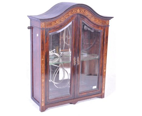 An early 20th century Edwardian mahogany inlaid china display cabinet. The cabinet having dome top, glass shelves and mirror 