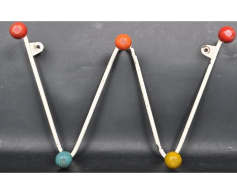 A vintage retro mid 20th century&nbsp;atomic sputnik coat rack of a W shape with wooden painted coat hooks and wire metal whi