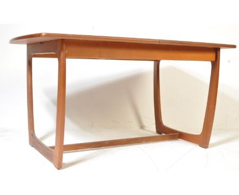 A mid 20th Century retro vintage crica 1960's&nbsp; teak wood Portwood Furniture extendable dining table.&nbsp; The table hav
