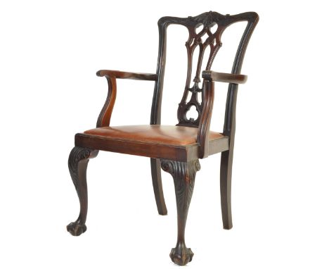 A late 19th century Victorian Chippendale style mahogany chair / dining chair. The chair raised on ball and claw feet with ca