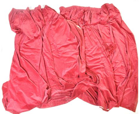 A pair of vintage retro 20th century curtains. The full size velvet curtains finished in dark red. Measures 219 x 154cm.&nbsp