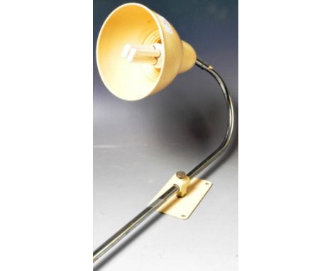 A retro vintage 1960's wall mounted work desk lamp light having a cream enamel shade mounted on a tubular adjustable column w