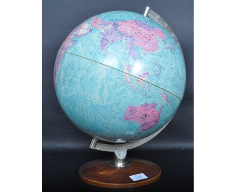 A vintage retro 20th century 12 inch stereo relief globe / terrestrial desk globe raised on a circular wooden base.