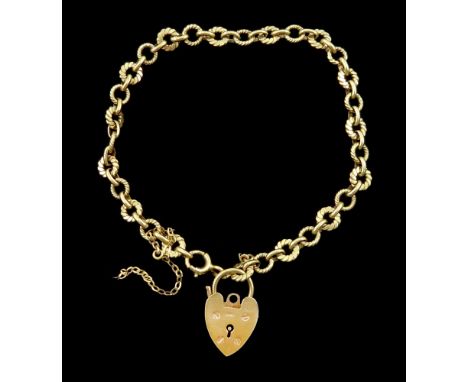 9ct gold fancy circular link bracelet, with heart locket charm, hallmarkedCondition Report:Approx 10.45gm, length = 21cm, saf