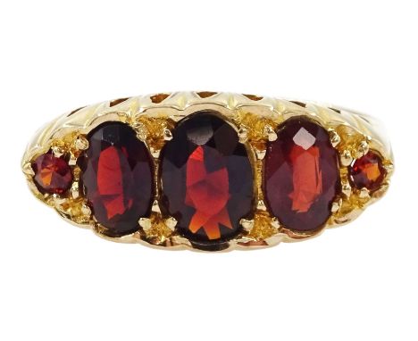 9ct gold five stone garnet ring, Birmingham 1973Condition Report:Approx 3.25gm, size R-S, max depth = 8.8mm, good condition