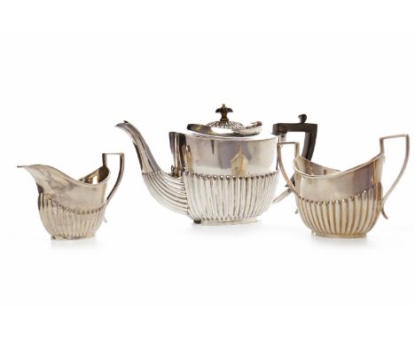 EDWARD VII SILVER THREE PIECE TEA SERVICE
maker John Henry Potter, Sheffield 1908, comprising teapot, sugar, creamer, each of