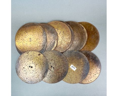 A group of fifteen 9.5" polyphon discs.