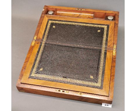 An early light mahogany veneered writing slope with inkwells, 17cm x 39.5cm x 24cm.