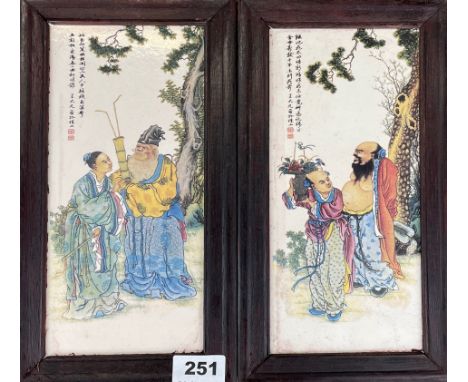 Two Chinese wooden framed ceramic panels, frame size 16 x 29cm.
