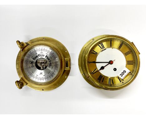 A ships style brass wall clock and a porthole style barometer without glass, Dia. 22cm.