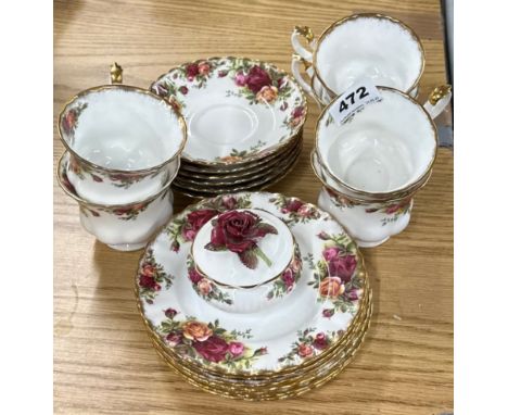 A Royal Albert Old Country Roses tea set, comprising six cups, saucers and plates, and a powder box (all first quality).