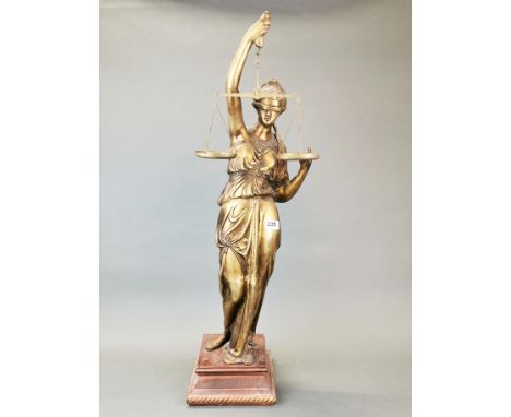 A large cast bronze figure of Justice on a wooden base, H. 74cm.