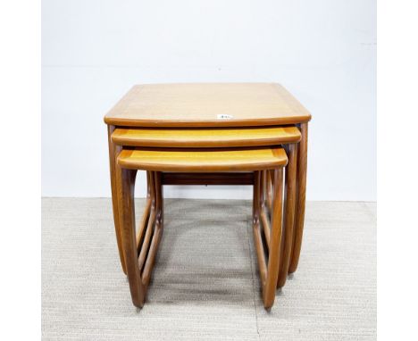 A Nathan light teak nest of three tables, 53 x 51 x 46cm.