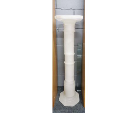 A sectional carved alabastar column with hollow interior allowing light inside, H. 98cm.