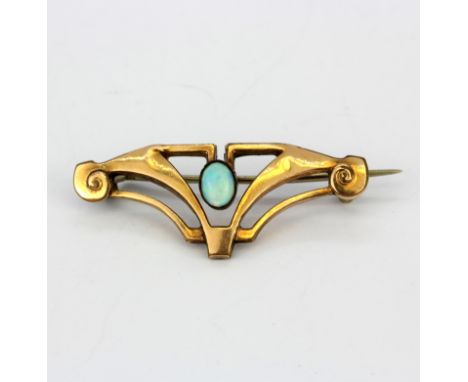 A handmade Jugendstil gold fronted brooch set with a cabochon cut opal, L. 3.6cm.