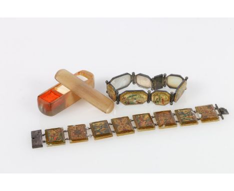 Two Persian bracelets with mother-of-pearl links depicting birds, temple and floral mosaic scenes on white metal mounts, also