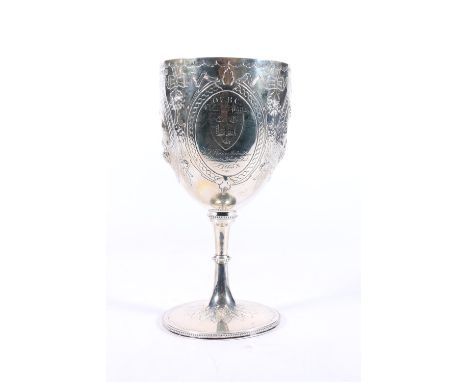 Oxford University Boat Club interest, a Victorian silver presentation chalice goblet with relief decoration, the central cart