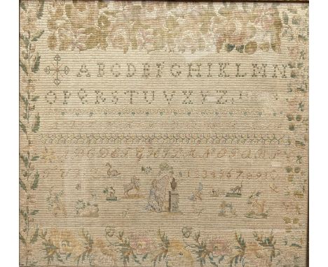 Antique needlework alphabet sampler with floral border enclosing multiple alphabets and numerical strands and depicting of an