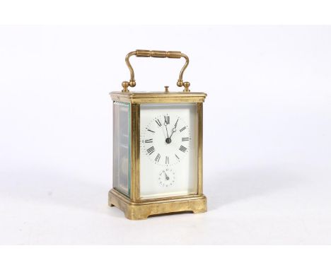 French brass repeater carriage clock with lever escapement, the dial with alarm subsidiary, 17cm to the top of the handle.&nb