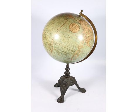 W and A K Johnston of Edinburgh New Century 12 inch terrestrial globe raised on cast iron tripod base, 56cm tall.  No dents f