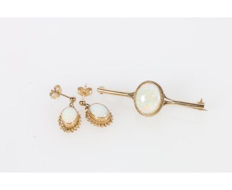 9ct gold brooch set with central cabochon opal and a pair of matching earrings, 4.3g 