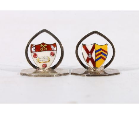 Two George V silver and enamel menu holders, one bearing the crest of Radley College by John William Barrett, Birmingham 1916