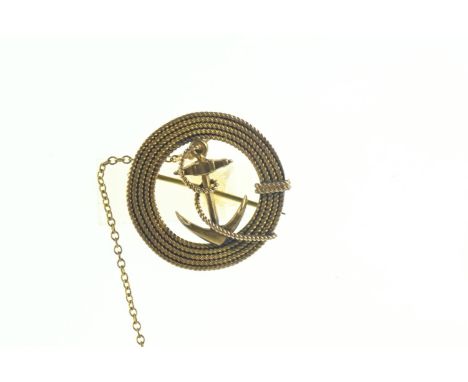 Small yellow metal brooch with anchor and safety chain, diameter 27mm, gross weight 4.3 grams 