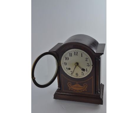 Wooden mantel clock with pendulum which is running with key. H31 W 23.5 D 13 cm 