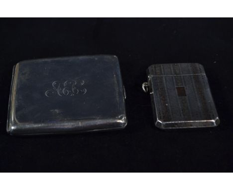 Silver and bi-coloured 14ct gold vesta, of hammered design with engine turned stripes to the front, length 6.5cm, together wi