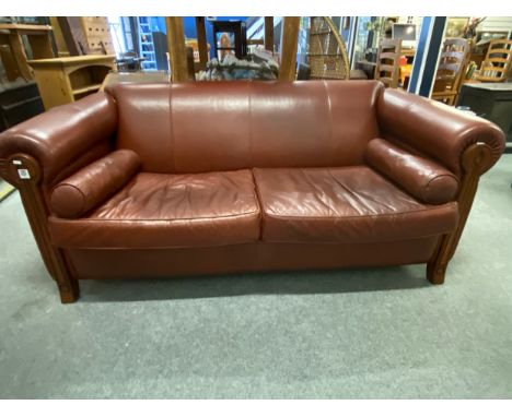 Large Leather 2/3 seater sofa with wooden trim and feet in a chestnut brown finish. W210 D 120 H88 cmGood 