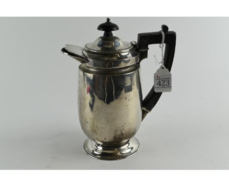 Late Victorian silver hot water jug, Hawksworth, Eyre & Co Ltd, London 1899, engraved armorial, with ebonised wood knop and h